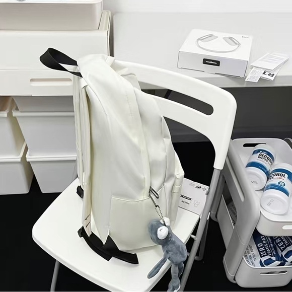 Black Book bag. Chic. Large capacity. Inspired by Bauhaus architecture .Backpack - Picture 6 of 9